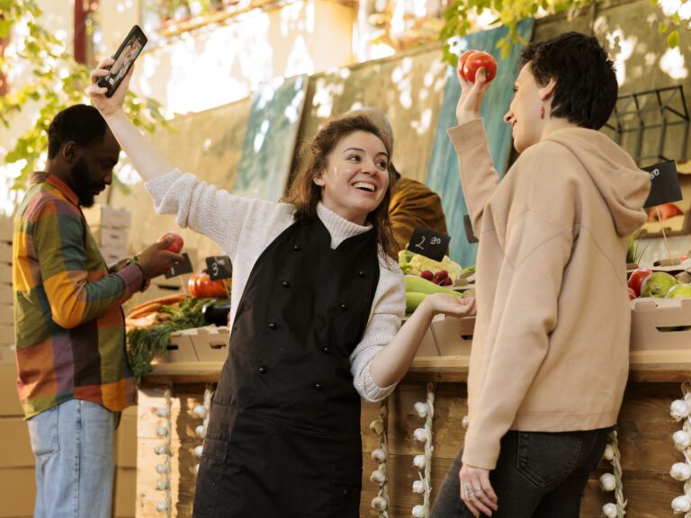 farmer-snaps-photos-with-client-market-france-by-locals